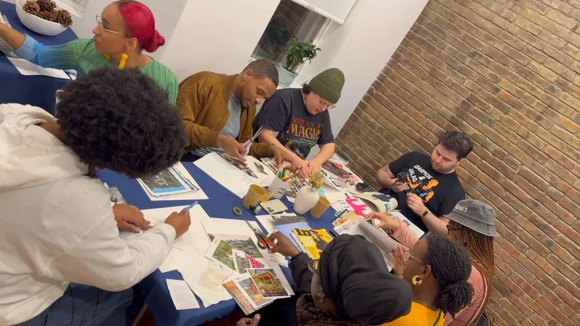 Group of diverse people participating in an art workshop at The 7 Space, Newark.