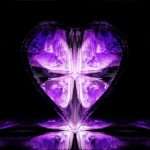 Bright purple heart-shaped ice sculpture with glowing effects.