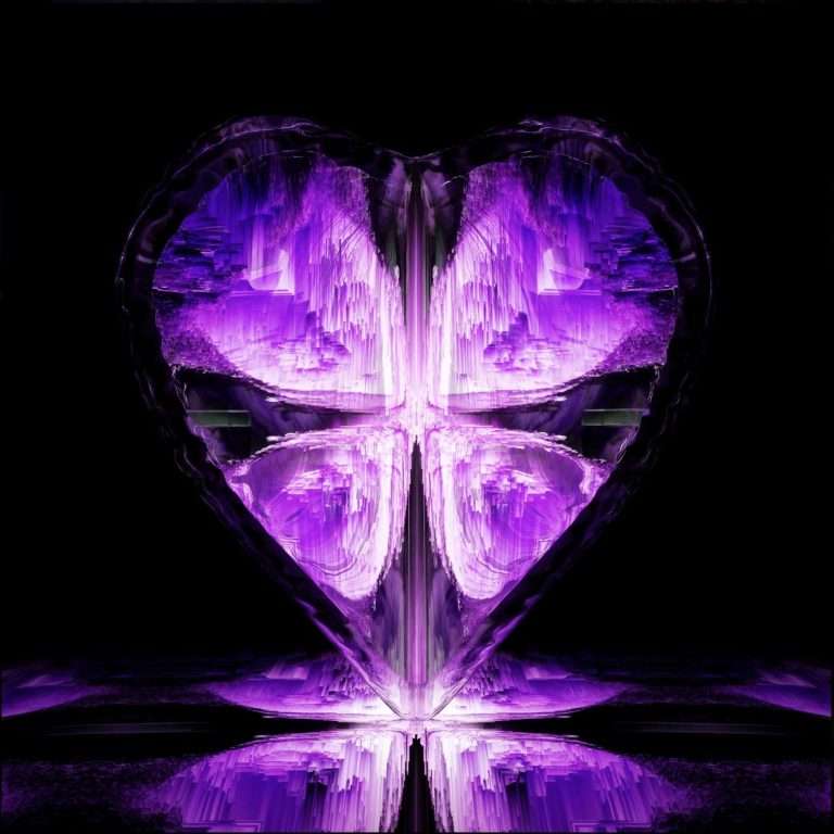 Bright purple heart-shaped ice sculpture with glowing effects.