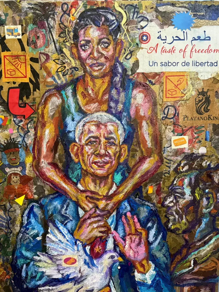 Artistic mural depicting Barack and Michelle Obama embracing, symbolizing unity and freedom.